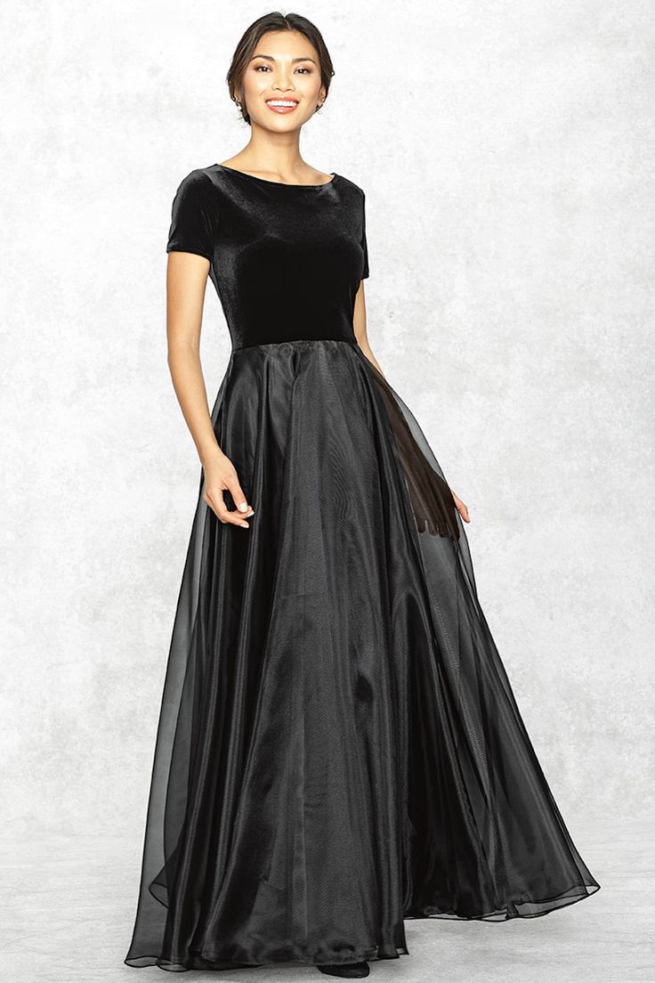 A full layer of organza over taffeta gives a soft sweeping motion to this feminine skirt. A luxurious black stretch velvet bodice provides an elegant and comfortable fit. Washable fabrics allow for easy care. Feminine Skirt, Dark Dress, Ball Gowns Evening, Ball Gowns Prom, Apron Dress, Gowns Of Elegance, Stretch Velvet, Bridesmaid Gown, Ball Gown Dresses