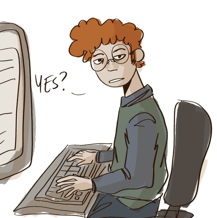 a man sitting in front of a computer with the words yes? written on it