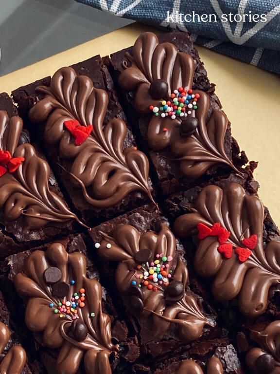 chocolate brownies with sprinkles and bows on them