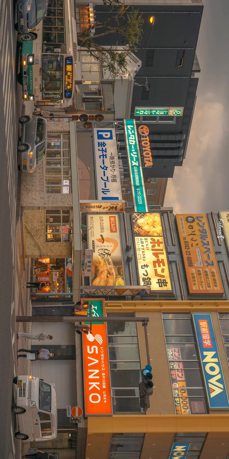 an overhead view of several buildings with signs on them