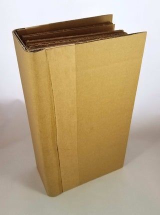 an open brown paper bag sitting on top of a white table