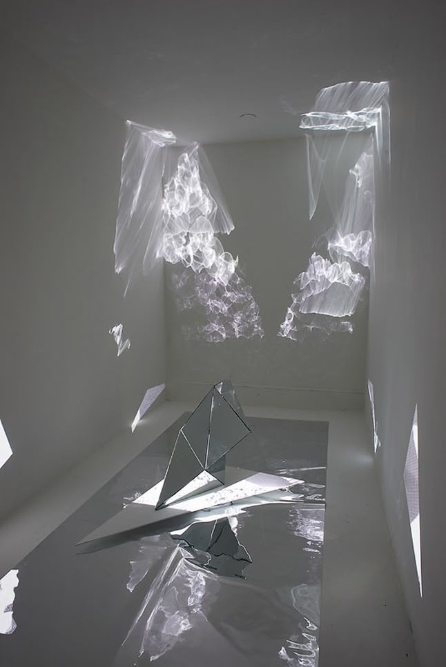 an abstract white room with plastic covering the floor