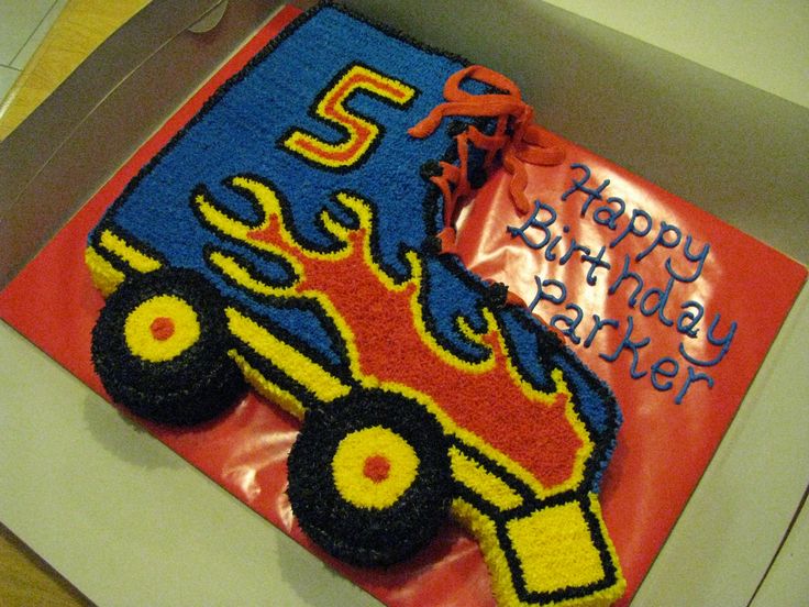 a birthday cake made to look like a monster truck