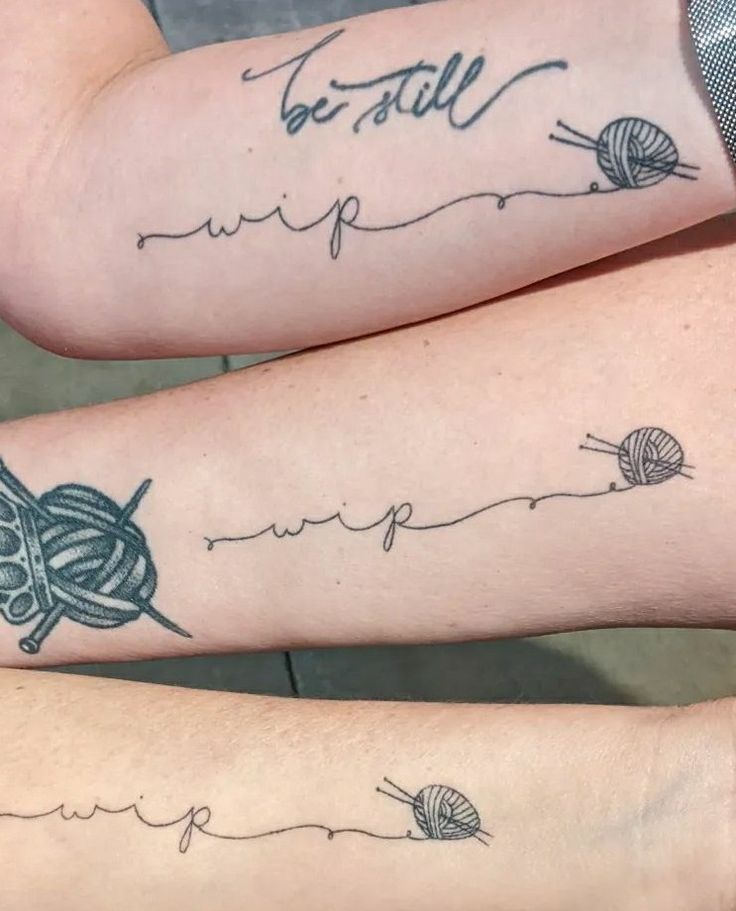 two people with tattoos on their arms and legs, one has a ball of yarn