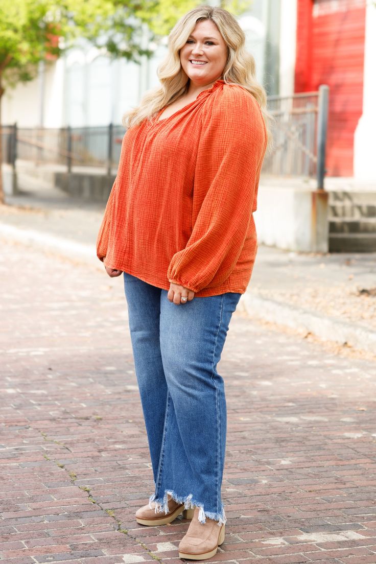 This top would look awesome in your wardrobe! Crafted in a bold rust color, the top's textured design and relaxed fit give it a subtle edge while still maintaining classic chic vibes! Pair it with distressed denim and booties for effortless style! 100% Viscose Chic Tops With Frayed Hem For Fall, Textured Tops For Fall, Fall Casual Blouse For Casual Gatherings, Casual Textured Tops For Fall, Casual Textured Long Sleeve Blouse, Fall Long Sleeve Blouse With Frayed Hem, Fall Textured Long Sleeve Blouse, Textured Long Sleeve Fall Blouse, Long Sleeve Blouse With Frayed Hem For Fall