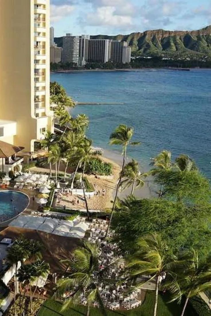 an aerial view of the pool and beach at four seasons resort waikiki