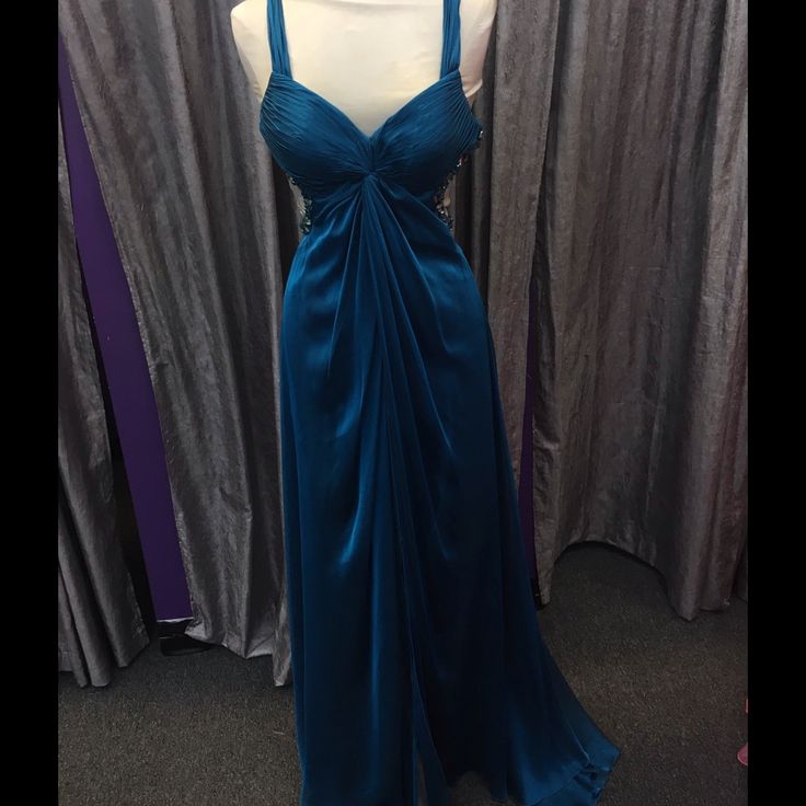 Blue Chiffon With Side Cut Out Gown Blue Chiffon Evening Dress For Prom, Blue Chiffon Evening Dress With Fitted Bodice, Blue Chiffon Dress With Sweetheart Neckline, Blue Lined Chiffon Dress, Blue Silk Evening Dress With Pleated Bodice, Blue Chiffon Dress With Pleated Bodice, Blue Chiffon Prom Gown, Blue Chiffon Gown For Prom Season, Blue Chiffon Gown For Prom