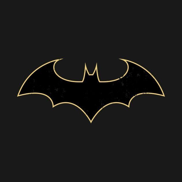 the dark knight logo in gold on a black background, it looks like batman's bat