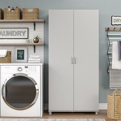 the laundry room is clean and ready to be used as a storage space for clothes