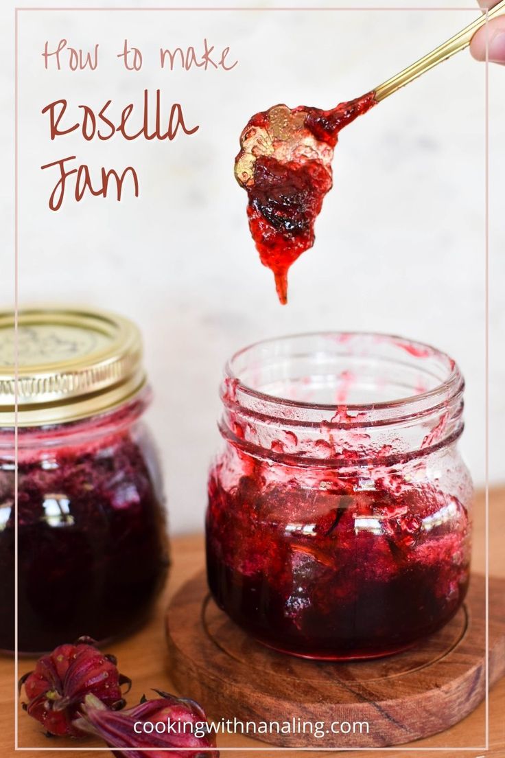 a spoon full of jam being lifted from a jar