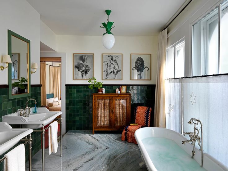 a bathroom with two sinks and a bathtub