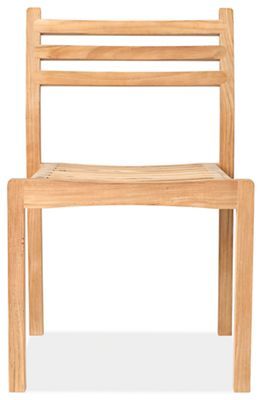 a wooden chair sitting on top of a white floor