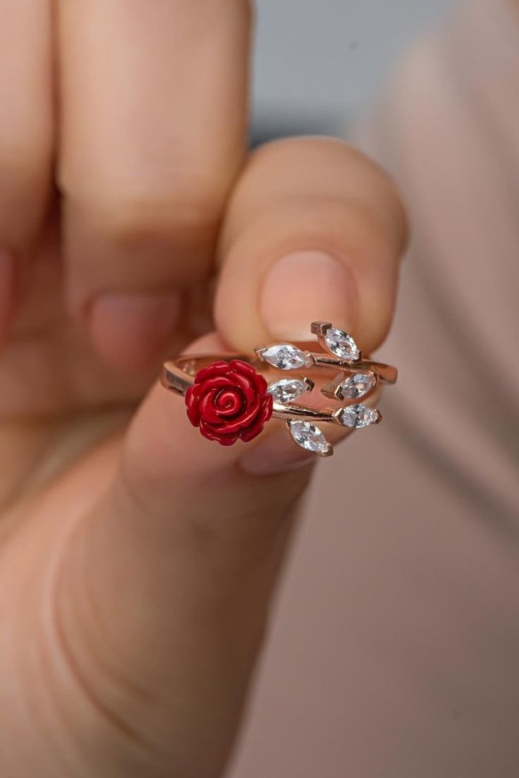 Ivy Model Red Rose Adjustable Size Ring Enhance your style with the Silver Ivy Model Red Rose Adjustable Size Ring. This charming ring features a beautifully crafted red rose design set with sparkling zircon stones, making it a perfect accessory for any occasion. Made from 925 Sterling Silver and finished with a rose veneer, it combines elegance with modern flair. 925 Sterling Silver is renowned for its elegance and durability, crafted from 92.5% pure silver mixed with 7.5% of a complementary me Rose Rings, Roses Jewelry, Red Rose Design, Resin Rose, Beaded Hat, Womens Jewelry, Rose Ring, Rose Jewelry, Diy Crafts For Gifts