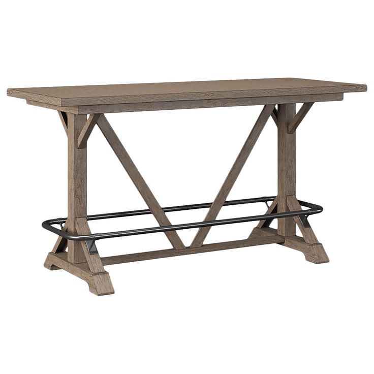 a wooden table with two benches underneath it and an iron bar attached to the top