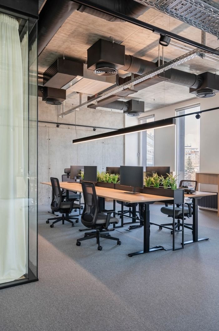 Hypoport Offices - Sofia | Office Snapshots Office Interior Design Workspaces, Modern Industrial Office Design, Modern Office Design Inspiration, Modern Industrial Office, Industrial Office Space, Open Concept Office, Open Office Design, Atelier Interior, Office Tables