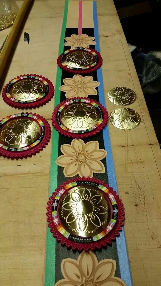 the table is covered with decorative plates and ribbons