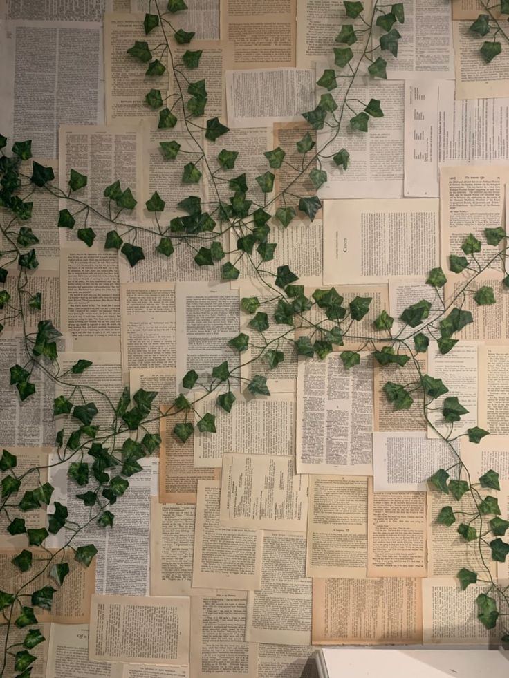 Book pages with vines Book Page Bedroom Wall Decor, Paper Wall Aesthetic, Book Page Wallpaper Bedroom, Book Page Wallpaper Diy, Book Page Collage Wall, Pages On Wall Aesthetic, Book Wall Bedroom, Book Pages Wall Decor Aesthetic, Wall Of Book Pages