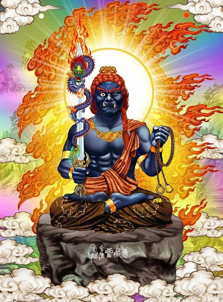 an image of the hindu god sitting on top of a rock with flames in the background