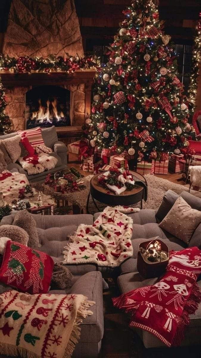 a living room filled with furniture and a christmas tree