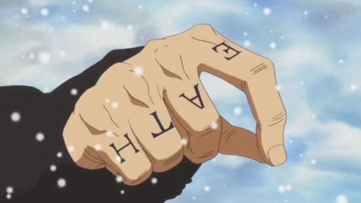 a person holding up their hand with the word evil written on it in front of snowflakes