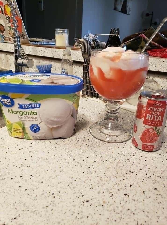 an ice cream and yogurt are sitting on the counter