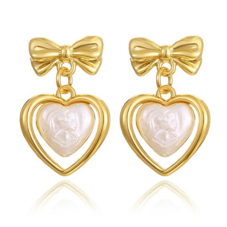 PRICES MAY VARY. Design: These gold bow heart earrings don't just feature hearts; they also have adorable gold bow studs on top, adding a whimsical and unique touch to your jewelry collection Optimal Size: The length of the bow heart earrings is 1.06 in, the width is 0.67 in, weight is 0.64 oz/pair Versatile Elegance: From date nights to casual outings, these gold bow earrings effortlessly transition from cute and casual to elegant and charming, making them a versatile addition to your wardrobe Vintage Heart Earrings, Ballerina Earrings, Gold Jewelry Earrings, Bow Jewelry, Heart Dangle Earrings, Knot Earrings, Bow Earrings, Big Earrings, Pink Earrings