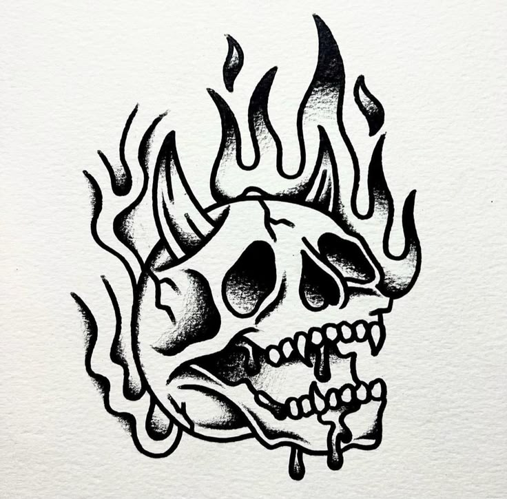 a drawing of a skull with flames on it