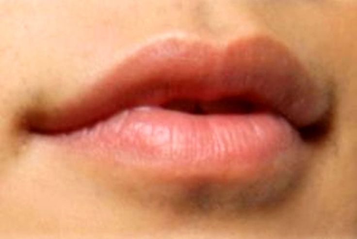 a woman's lips are shown in this close up photo