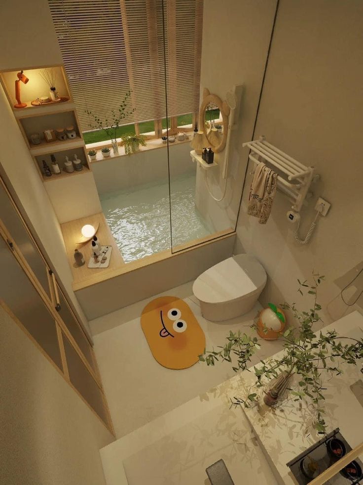 an aerial view of a bathroom with a sink, toilet and bathtub in it