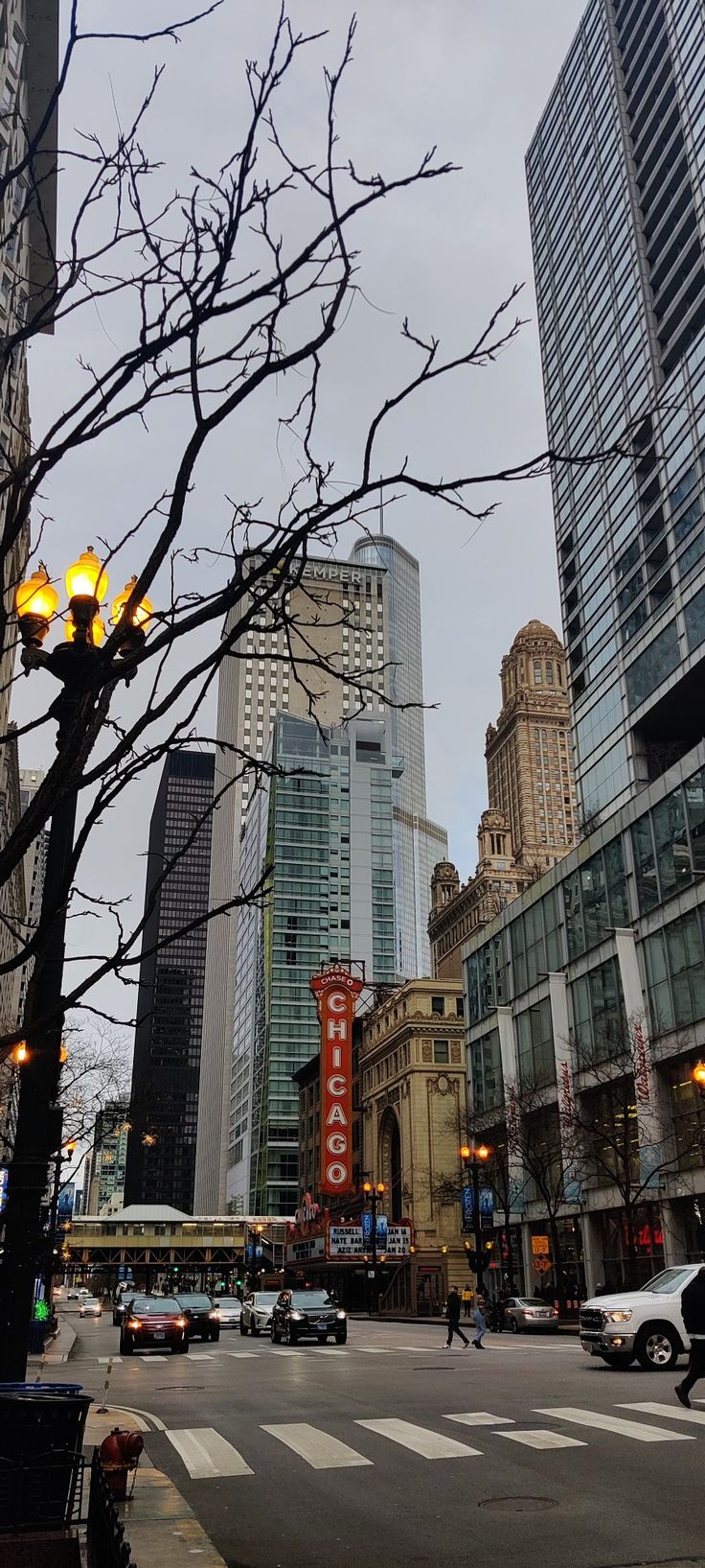 a city street filled with lots of tall buildings