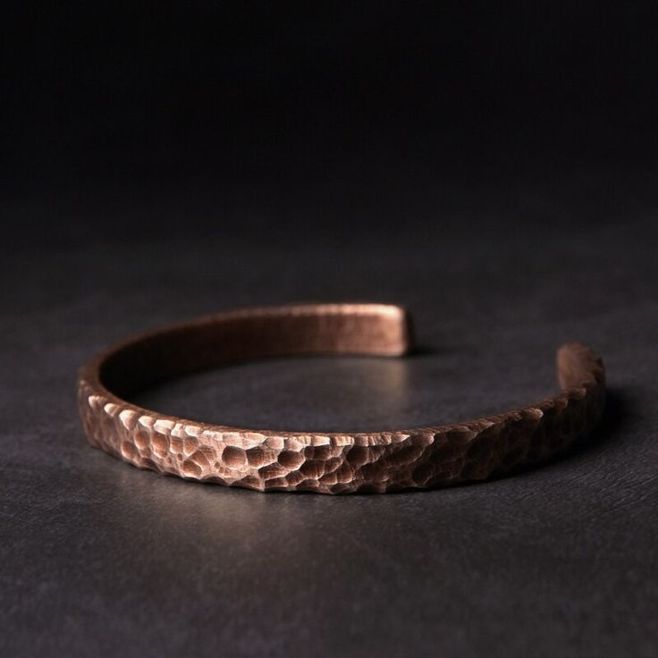 Handmade Hammered Solid Copper Metal Bracelet - Rustic Vintage Punk Unisex Cuff Bangle Viking Jewelry Chain Type: Beaded Bracelet Shape\pattern: Round Setting Type: None Material: Metal Style: Vintage Gender: Unisex Metals Type: copper Bracelets Type: Cuff Bracelets Item Type: Bracelets Fine or Fashion: Fashion Metal type: Copper Process: Handmade Looking for a unique and stylish piece of jewelry that's perfect for both men and women? Our handmade hammered solid copper metal bracelet is the perfect choice. This rustic vintage punk unisex cuff bangle Viking jewelry piece is handcrafted with care and attention to detail, making it a beautiful and meaningful accessory. Crafted from solid copper, this bracelet has a beautiful hammered texture that gives it a rustic and vintage look. The unisex Hammered Cuff Bracelet, Didgeridoo, Copper Cuff, Metal Bracelet, Vintage Punk, Gongs, Handmade Jewelry Gift, Viking Jewelry, Copper Bracelet