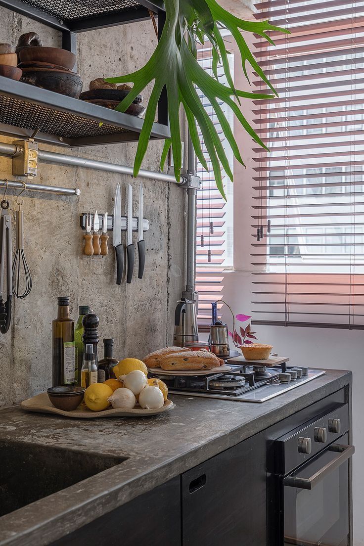 the kitchen counter is clean and ready to be used as a cooking station for food preparation