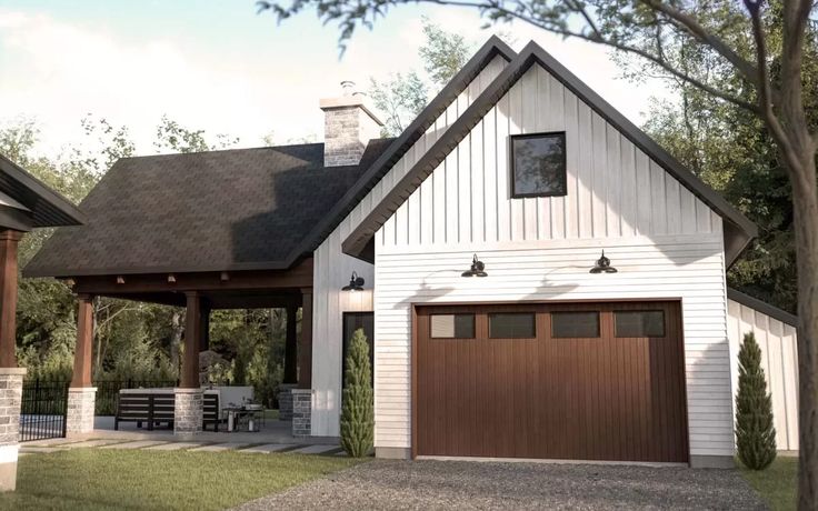 this is an artist's rendering of a house in the country style with two car garages