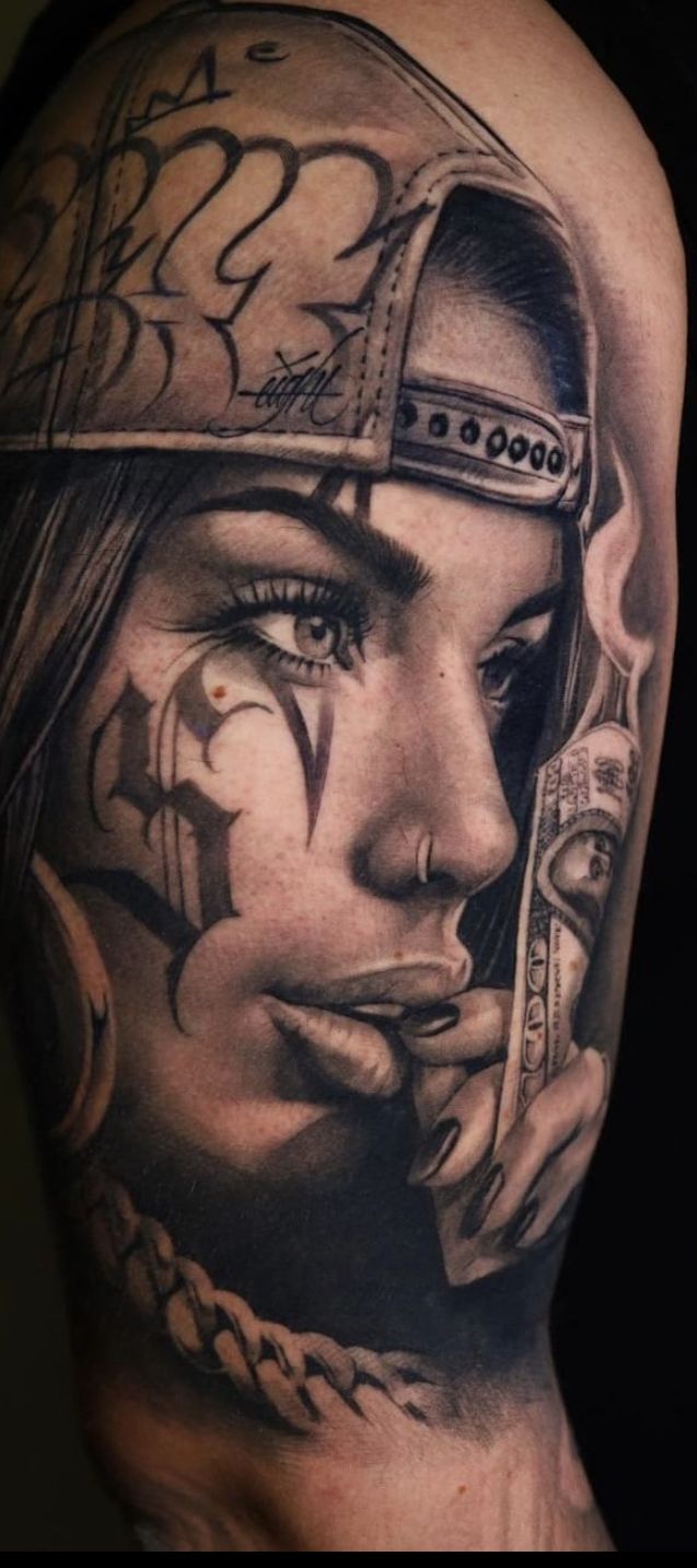 a woman's face with tattoos on her arm