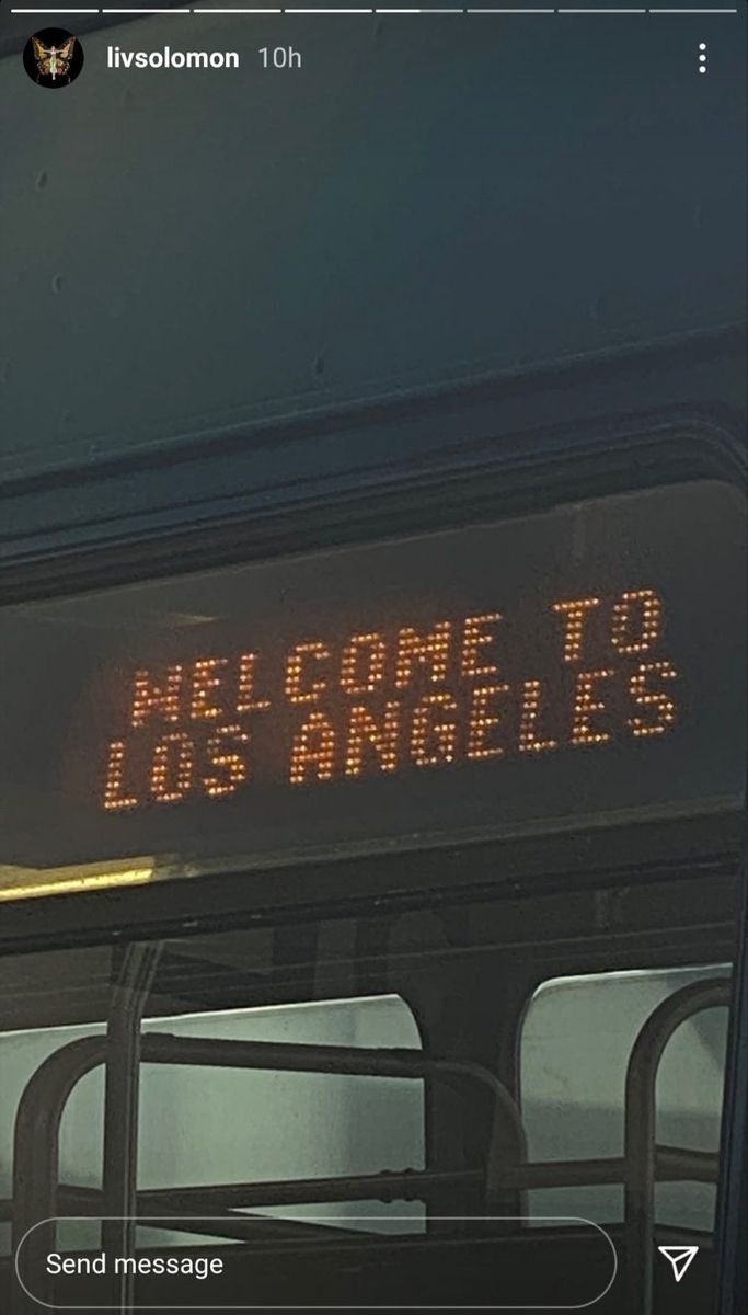 a sign that says no more to los angeles on the side of a bus at night