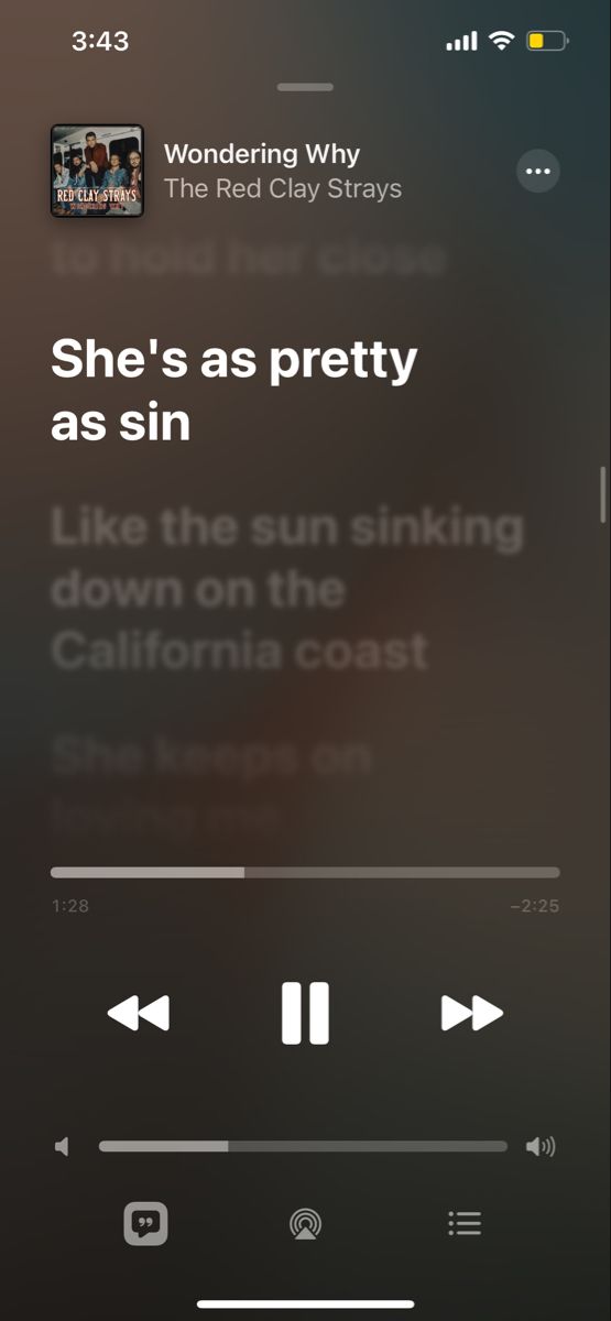 an iphone screen with the text she's as pretty as sin sinking down on the california coast