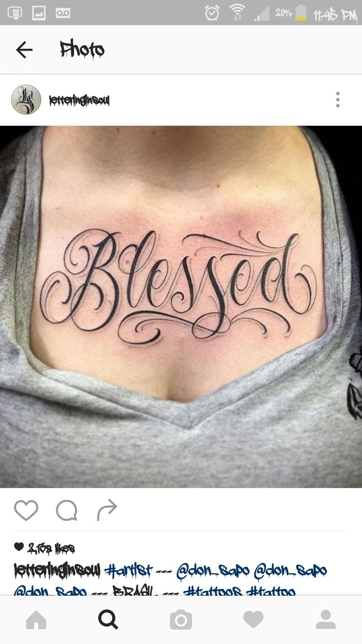 a woman with a chest tattoo that says,'blessed'in cursive script