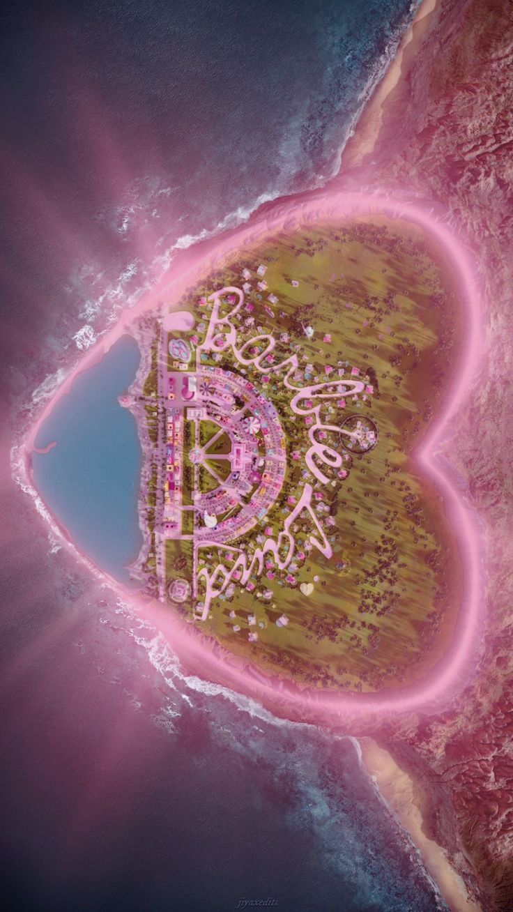 an aerial view of a pink island in the middle of the ocean with words written on it