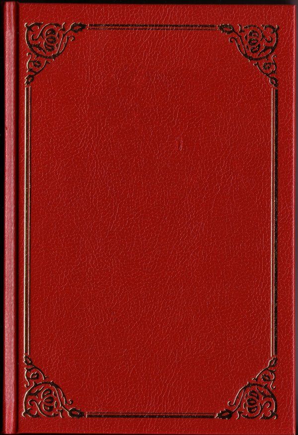 a red leather book with an ornate border