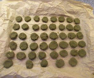 the dough is covered with green powdered cookies