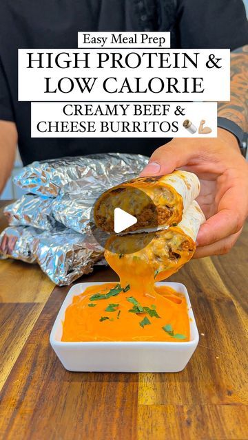 a person is dipping some food into a small bowl on a wooden table with the words high protein and low calorie creamy free cheese burritos