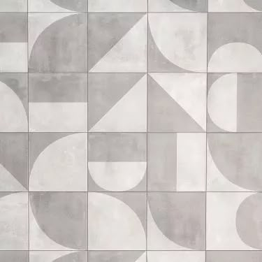 an abstract tile design with various shapes and sizes in grey tones, including circles and rectangles