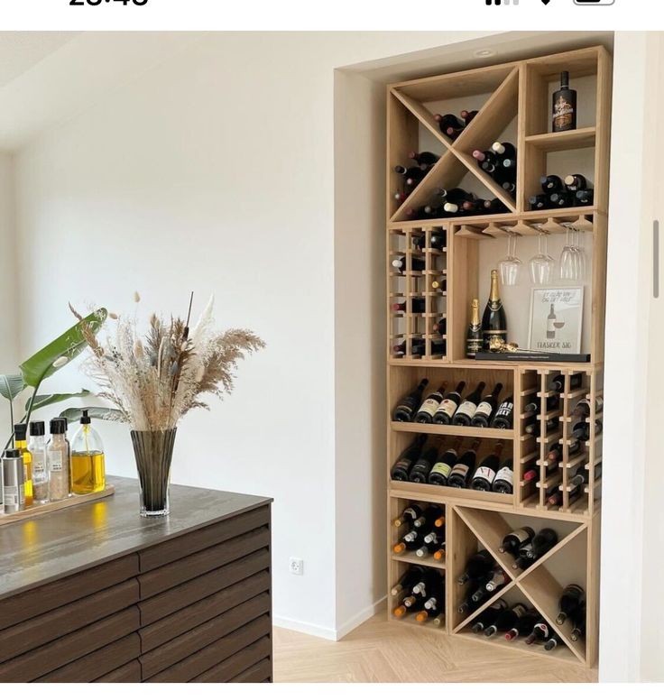 a wine rack in the corner of a room