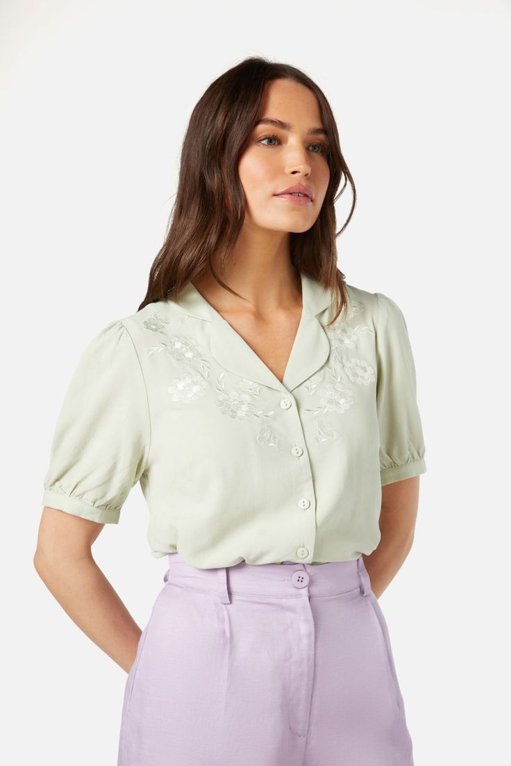 mint Puff Sleeve Button Up, Fitted Floral Embroidery Top With Collared Neckline, Classic Short Sleeve Rayon Tops, Summer Embroidered Shirt With Collared Neckline, Feminine Floral Embroidery Blouse For Workwear, Embroidered Short Sleeve Workwear Blouse, Workwear Embroidered Short Sleeve Blouse, Fitted Embroidered Top With Collared Neckline, Fitted Short Sleeve Collared Shirt For Summer