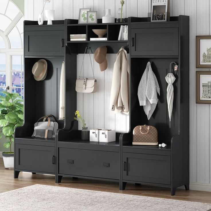 a large black cabinet with hats and purses on it's shelves next to a white rug