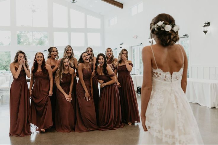 a group of women standing next to each other