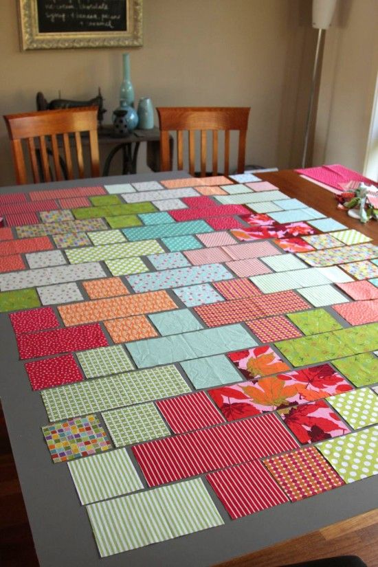 the table is covered with many different colored squares