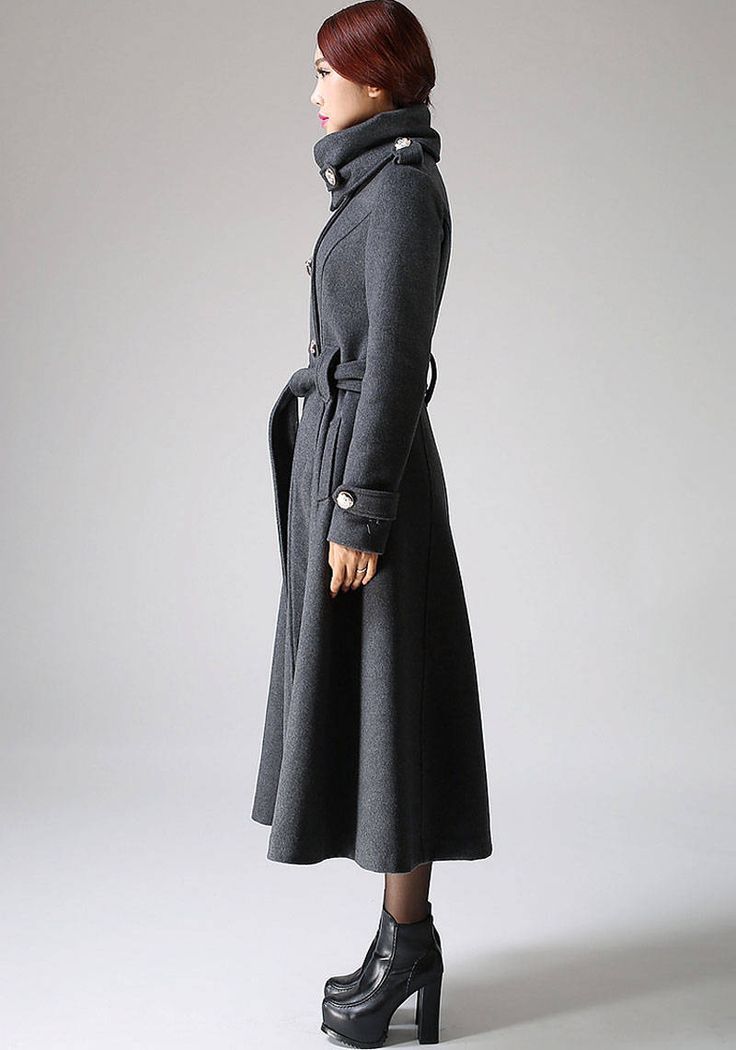 "Double breasted coat that's been expertly sourced by Xiaolizi. The military coat made from gray wool fabric in a super fitted button-down front closure. The long trench coat topped with a warm collar. The custom coat finished with long sleeves that feature button tabs. **DETAILS** * 50% wool, 50% polyester, polyester lining * An oversized collar with a buttoned tab * double breasted front with a button closure * long sleeve styling with button tabs to the cuff * diagonal pockets to the hips * m Gray Buttoned Outerwear For Winter, Winter Long Sweater Coat With Buttons, Gray Fitted Winter Pea Coat, Fitted Gray Winter Pea Coat, Fitted Gray Pea Coat For Winter, Gray Double-breasted Winter Outerwear, Gray Winter Sweater Coat With Buttons, Long Winter Pea Coat With Button Closure, Gray Single-breasted Wool Coat For Fall