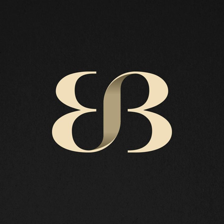 the letter b is made up of gold foil and it looks like an elegant monogramic