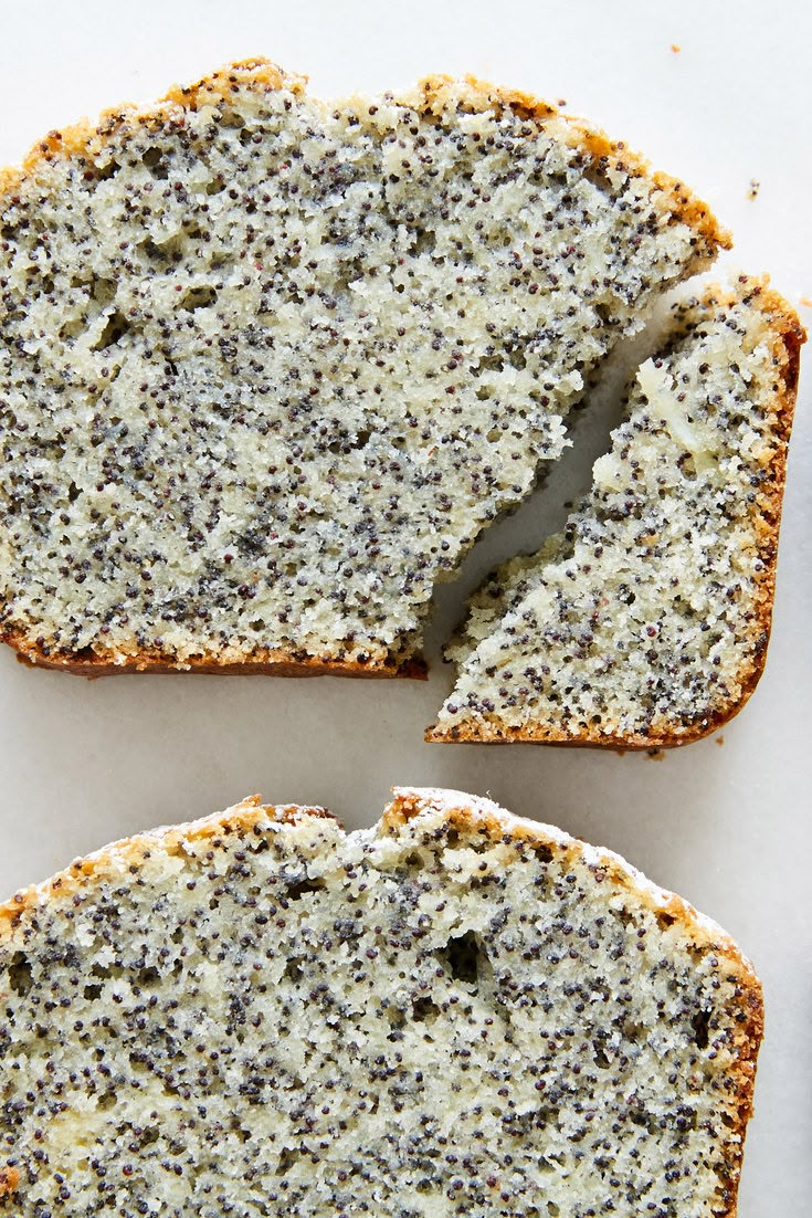 two pieces of bread that have been cut in half and are sitting next to each other